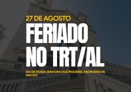 A imagem apresenta um card informativo com um fundo escuro e levemente desfocado que exibe a fachada de uma igreja histórica vista de baixo para cima. No centro, sobrepostos à imagem, aparecem os textos destacados: no topo, a data "27 DE AGOSTO" em letras amarelas; no meio, a frase "FERIADO NO TRT/AL" em grandes letras brancas em caixa alta; e, na parte inferior, a justificativa "DIA DE NOSSA SENHORA DOS PRAZERES, PADROEIRA DE MACEIÓ", também grafada em amarelo.
