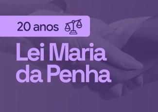 Card com as palavras Lei Maria da Penha 20 anos, com duas mãos de pano de fundo