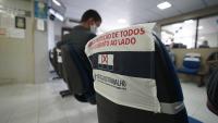 Sala de espera para audiência com aviso de distanciamento 