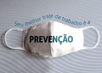 Imagem de uma máscara branca com o texto: seu melhor traje de trabalho é a Prevenção