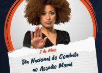Foto de uma mulher negra fazendo o sinal de basta com a mão direita.