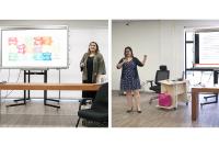 Há duas mulheres de pé . Elas estão ao lado de uma tela. Ambas estão dando aula.