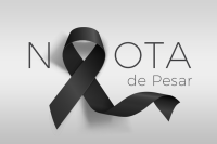 Na imagem, o nome nota de pesar escrito em letras na cor preta, sendo que o primeiro o do nome nota está em forma de uma fita preta