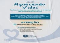 Imagem com a cor de fundo cinza e o nome aquecendo vidas centralizado na parte superior em letras azuis