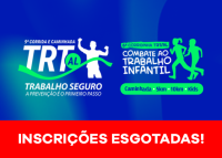 A imagem divulga a 9ª Corrida e Caminhada TRT/AL – Trabalho Seguro e a 6ª Corridinha TRT/AL – Combate ao Trabalho Infantil. O material tem fundo azul com detalhes em verde e mostra silhuetas de pessoas correndo. Na parte inferior, há uma faixa vermelha com a frase em destaque: “INSCRIÇÕES ESGOTADAS!”. O evento oferece modalidades de caminhada, 5 km, 10 km e kids.